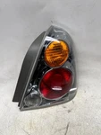 2002-2004 Nissan Altima Right Passenger Side Tail Light Quarter Panel Mounted. Fixed Price $45.00.