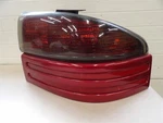 Dodge Intrepid 1995-1997 Rh Passenger Side Taillight Assembly Maroon Lower Trim. Fixed Price $61.10.