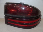 Dodge Intrepid 1995-1997 Rh Passenger Side Taillight Assembly Painted Lower Trim. Fixed Price $79.90.