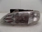 Driver Left Headlight Fits 96-98 Grand Am 1773157. Fixed Price $82.00.