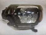 2013-2016 Toyota Tacoma Passenger Headlight With Smoked Trim *damaged Tabs*. Fixed Price $189.05.