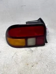 1994-1996 Ford Aspire Driver Left Side Tail Light Lamp Assembly Oem. Fixed Price $49.00.