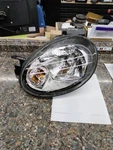 Driver Left Headlight Fits 03-05 Neon 1208212. Fixed Price $90.00.