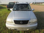 Driver Left Headlight Base Fits 99-05 Vitara 199844. Fixed Price $76.00.