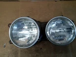 1988 Bmw 528E Base, Green, Dual Left Driver Headlamp/ Light. Fixed Price $87.00.
