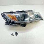 Genuine Oem Front Right Headlight Assembly For Saab 12775747 Rh. Fixed Price $250.00.