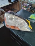 2007-2008 Kia Sorento Passenger Right Headlight Fits Thru 04/21/08. Fixed Price $129.00.