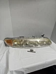 Passenger Right Headlight Thru Vin 310236 Fits Alero 99862. Fixed Price $40.00.