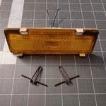 1982-1992 Pontiac Firebird Right Front Side Marker Reflector Signal And Mounts. Fixed Price $15.00.
