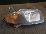 Passenger Right Headlight Fits 03-05 Cavalier 2055875. Fixed Price $80.00.