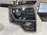 Passenger Headlight Xenon Hid Fits 13-14 Ford F150 Raptor 2126058. Fixed Price $549.86.