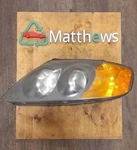 Driver Left Headlight Fits 03-04 Tiburon 87380. Fixed Price $42.00.