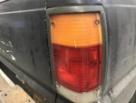 Passenger Right Tail Light Black Moulding Fits 87-93 Mazda B-2200 2411258. Fixed Price $56.75.