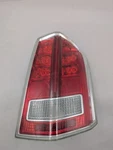 Passenger Tail Light Without Smoked Lens Chrome Trim Fits 13-14 300 357075. Fixed Price $104.00.