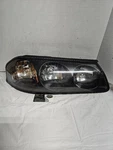 Passenger Headlight Thru 2/5/04 Chrome Dome Over Bulb Fits 00-04 Impala 119294. Fixed Price $45.00.