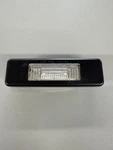 New Genuine Bmw License Plate Light For E32 E34 63261388927. Fixed Price $32.00.