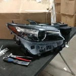 Headlight Fits 2022 Mazda CX-9 Am Assy In Stock Profit+ Lens Chip Right. Fixed Price $604.99.