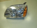 2010 Galant Left Headlight Aftermarket & Scratched On Top 193188. Fixed Price $110.00.