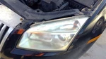 Driver Left Headlight Halogen Thru 2/19/06 Fits Milan 1852435LAMP Assembly. Fixed Price $90.00.