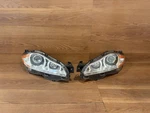 2010-2105 Jaguar Xjl Right & Left Hid Xenon Headlight Lamp Pair Oem. Fixed Price $1046.50.