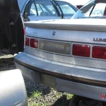 Chevrolet Lumina "euro", 1990, 1991, 1992-1994, Center Tail Light, W/gray Edge. Fixed Price $40.00.
