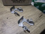 (25) Auveco 15940. Headlight Component Pivot Retaining Clip. Fixed Price $20.00.