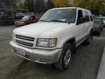 99 00 01 02 Isuzu Trooper L. Headlight. Fixed Price $100.00.