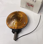 56053 Amber Stop Tail Light W/ Black Dominion 70-6064 Metal Housing 73-1791-A. Fixed Price $25.00.