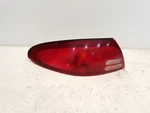 1998-02 Ford Escort (sedan) Drivers Left Tail Light Quarter Mount. Fixed Price $31.85.