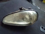 Driver Left Headlight Thru Vin 405125 Fits 92-95 Mazda MX-3 142010. Fixed Price $125.00.