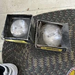 2NOS 6" General Electric Powerplus Halogen 12 Volt High Beam Headlight H4001. Fixed Price $14.00.