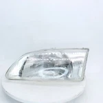 Tyc Left Head Lamp Assembly Part Number 114-58517L For 1999 Mazda 626. Fixed Price $38.99.