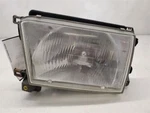 Toyota 4 Runner Iq, Left Headlamp With Bracket, 1996-1998, 81150-35210. Fixed Price $129.92.