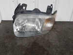 2001-04 Ford Escape Drivers Left Headlight *grade B*. Fixed Price $33.32.