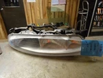 Passenger Right Headlight Fits 95-99 Aurora 104592. Fixed Price $145.00.