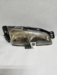 Passenger Right Headlight Fits 92-95 Grand Am 60626. Fixed Price $55.00.