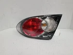 Passenger Tail Light Black Background Hatchback Fits 06-08 Mazda 486491. Fixed Price $31.84.