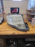 08 09 Ford Taurus X Passenger Headlamp Light Assembly Right Oem. Fixed Price $99.85.