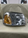 2002-09 Gmc Envoy Right Passenger Side Halogen Headlight Lamp. Fixed Price $100.00.