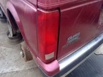Driver Left Tail Light Without Chrome Moulding Fits 87-90 Caravan 1107605. Fixed Price $84.00.