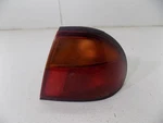 Passenger Right Tail Light Outer Fits 96-98 Mazda Protege 127147. Fixed Price $82.00.