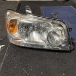 Passenger Headlight Assembly Toyota Highlander Hybrid Fits 04, 05, 06 1123962. Fixed Price $19.50.