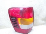 Driver Left Tail Light Fits 03-04 Jeep Grand Cherokee K15-195038. Fixed Price $37.38.