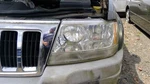 Driver Headlight Crystal Clear Fits 99-04 Grand Cherokee 2684315. Fixed Price $107.00.