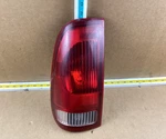 1997-1999 Ford F-150 F-250 Driver Left Rear Tail Light Assembly. Fixed Price $48.99.