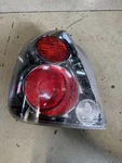 2002-2004 Nissan Altima Left Side Quarter Panel Mounted Tail Light Oem Chipped. Fixed Price $32.00.
