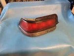 88 89 Grand Prix Left Tail Light Plain Lens 101868. Fixed Price $69.85.