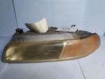 Driver Left Headlight Fits 97-00 Breeze 26456. Fixed Price $40.00.