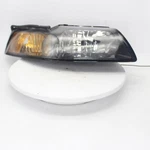 2004 Ford Mustang Rh Head Lamp Part Number 114-00639BR. Fixed Price $34.99.