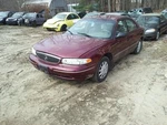 Tail Light Lid Mounted Without Emblem Fits 97-99 Century 58497. Fixed Price $45.00.